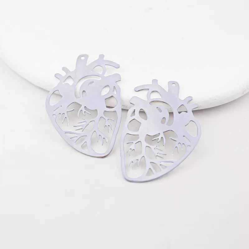 laser cut human heart brass charms in silver tone