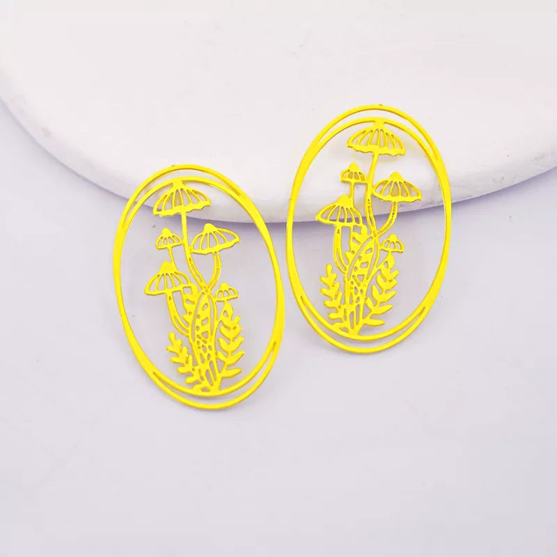 Golden Geometric Oval Pendant with Mushrooms and Leaves