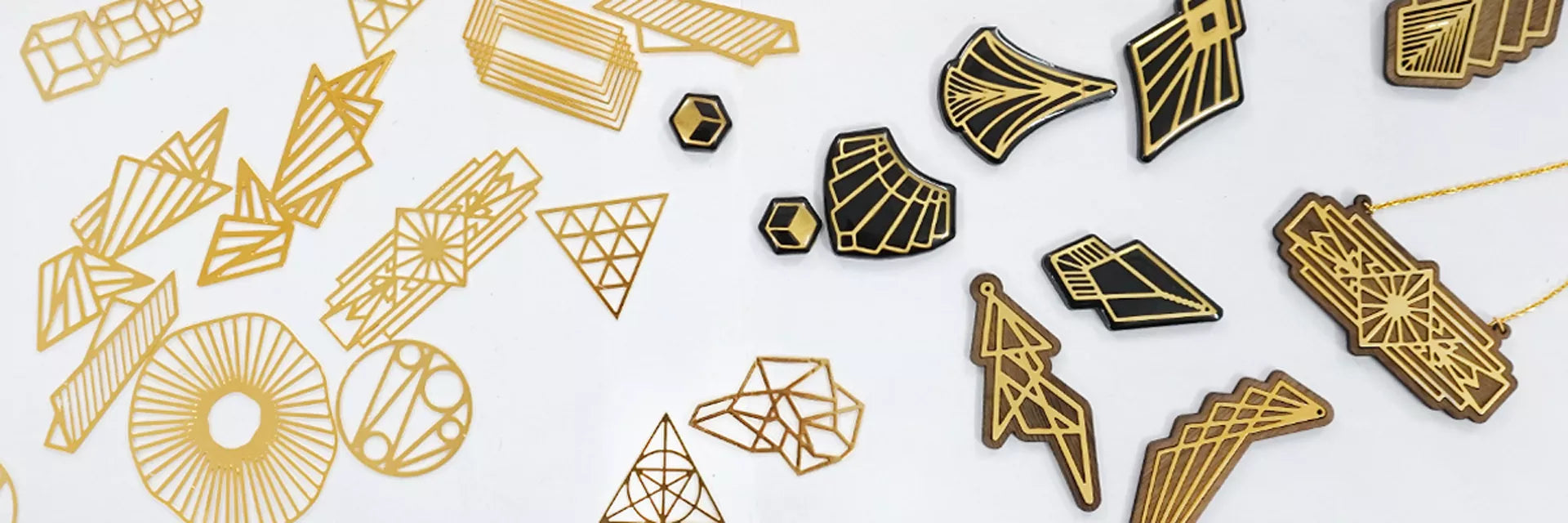 laser cut your own jewelry charms in stainless steel and raw brass